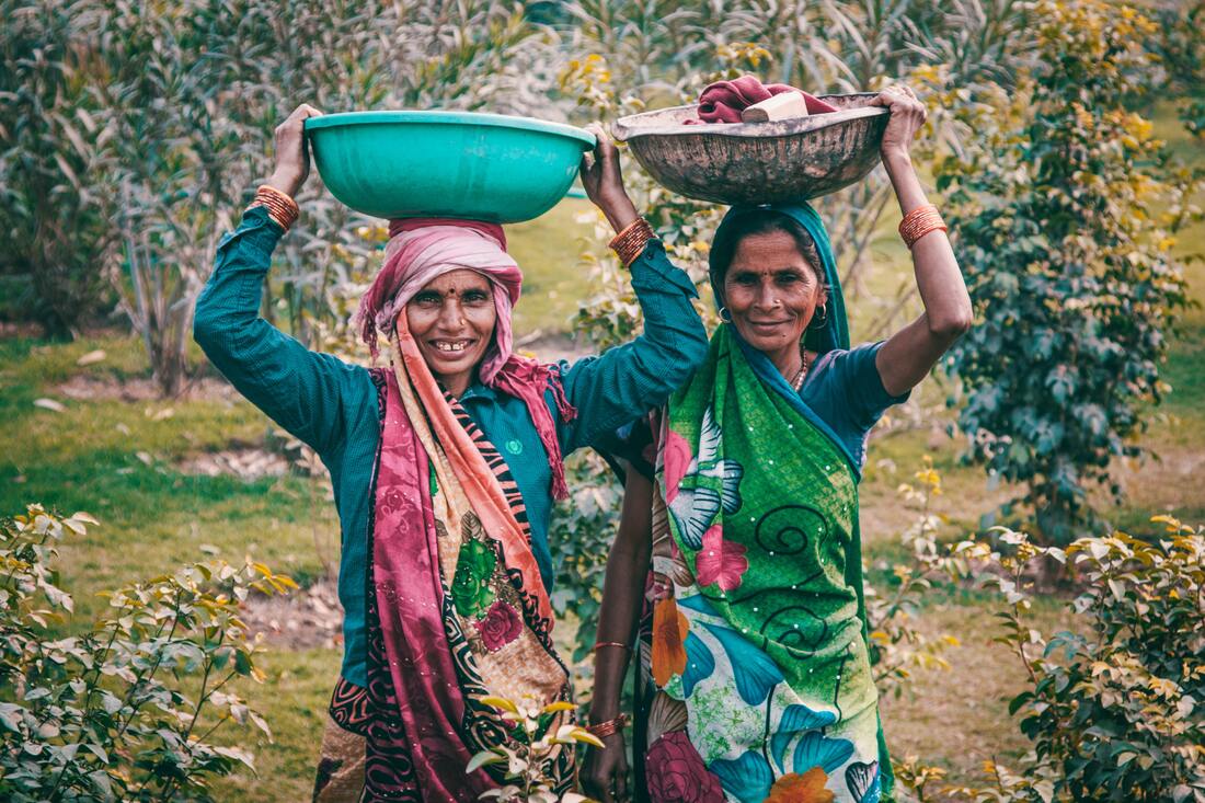 Photo by Jose Aragones: https://www.pexels.com/photo/two-women-wearing-traditional-dress-carrying-basins-860577/